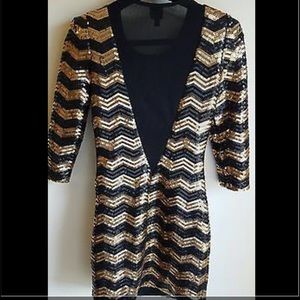 Black and gold Sequin bebe dress
