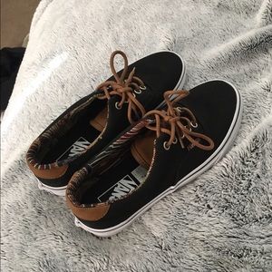 Black and brown patterned Vans