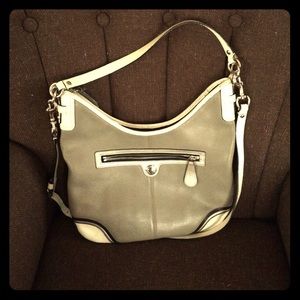 Grey and white coach purse
