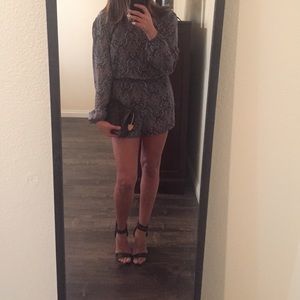 Long sleeve printed romper ! Never worn !