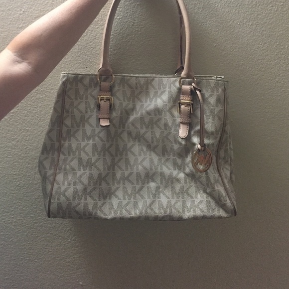 Michael Kors white bag.