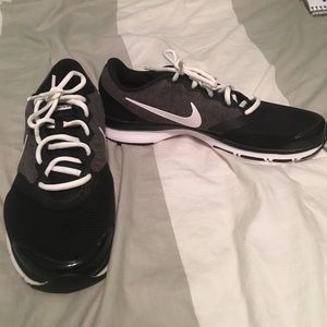 Black and grey Nike shoes