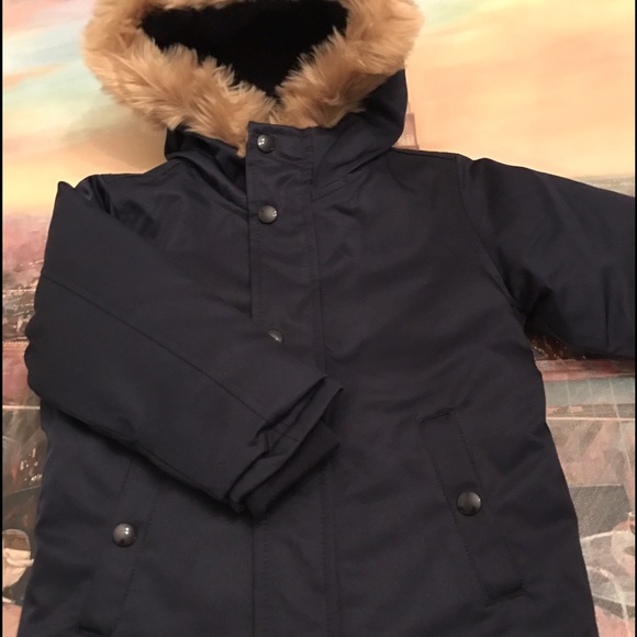 Children place new coat