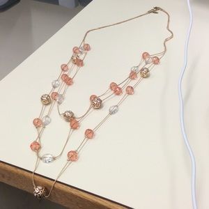 Multi strand gold beaded necklace