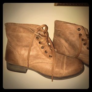 Short heeled brown booties.