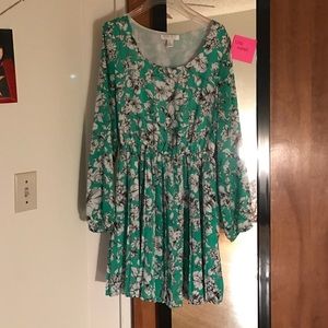 Green and white patterned dress