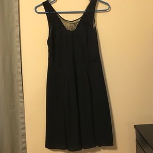 Black sleeveless mini dress