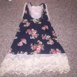 Flowered top with lace bottom and low cut sides