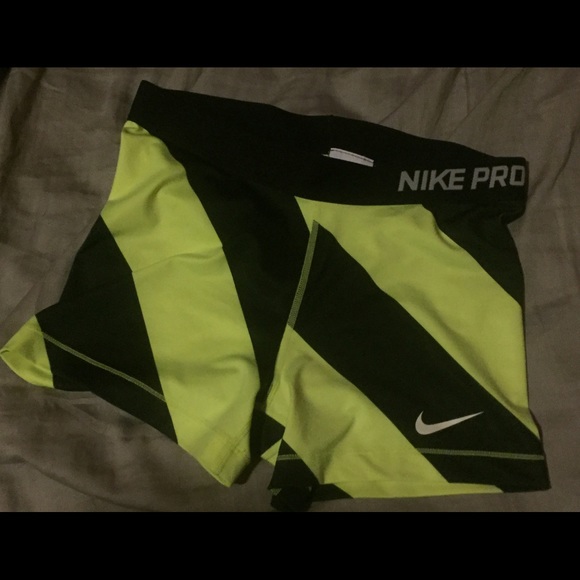 Black and Neon green Nike Pros