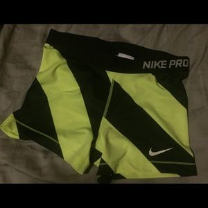 Black and Neon green Nike Pros