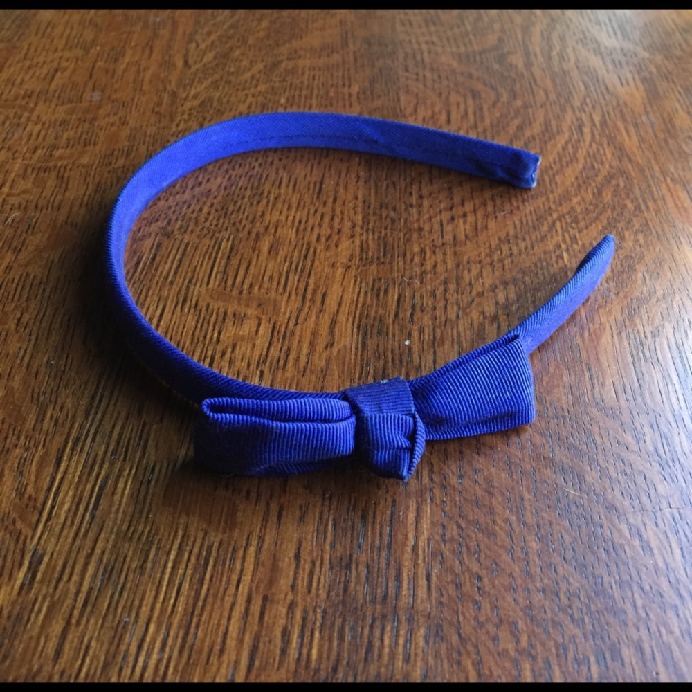 Bluish purple headband with a side bow