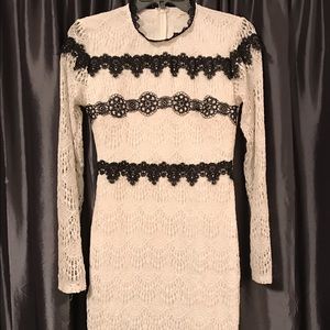 Beautiful white dress with black accent!