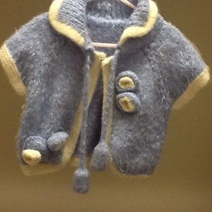 Hand knitted cape