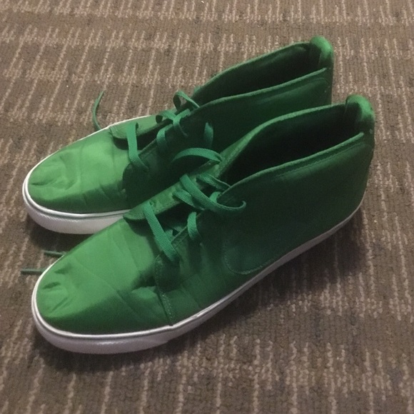 Size 14 Green Nike high top sneakers.