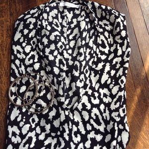 Black and white patterned blouse
