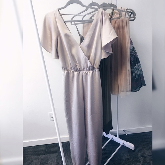 Sale LAST PRICE. BeBe jumpsuit come with a belt
