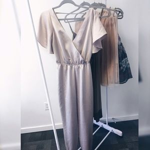 Sale LAST PRICE. BeBe jumpsuit come with a belt