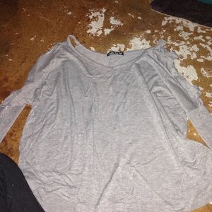 Gray shirt with cutout sleeve