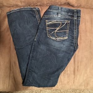 Silver slim bootcut jeans size 30.