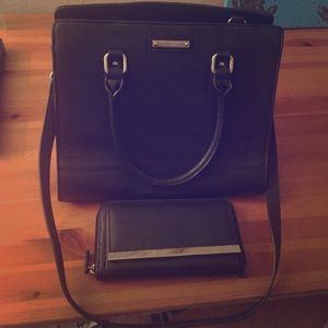 Black Nine West handbag w/ wallet practically new.