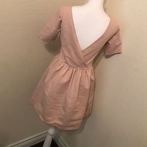 Really pretty blush pink v-back dress.