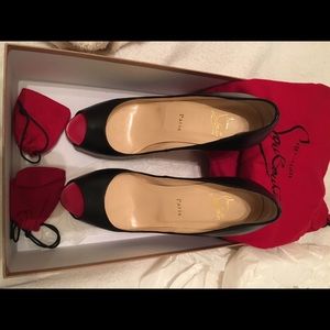 Authentic Christian Louboutin peep toe heels