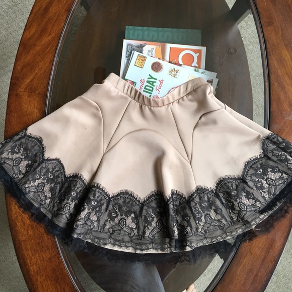 Tan skirt with black lace detailing