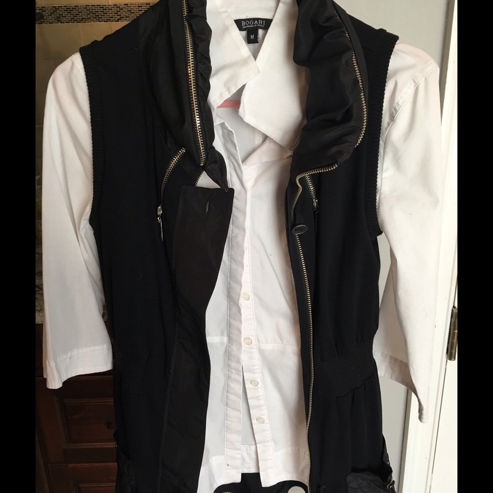 Vest, black really cute, fitting in back.