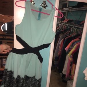 Blue dress with cutouts on the sides