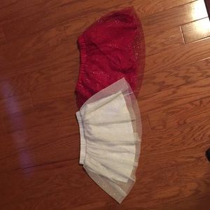 Girls glitter skirt bundle. One red one white.