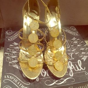 Gold stiletto platform heels