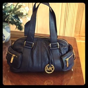 Brand new Michale Kors navy and gold handbag.