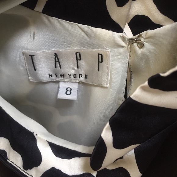 Black and with slick top with zippers on the back - Picture 3 of 3