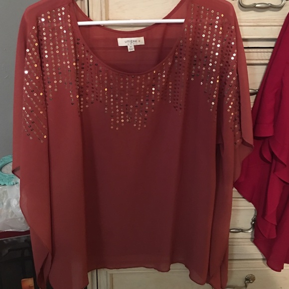 Boutique top. Rust colored short sleeve top.