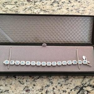 Sterling silver and blue topaz tennis bracelet!!