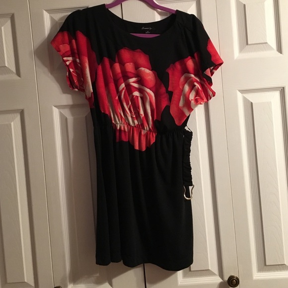 Casual black dress with large roses and a belt