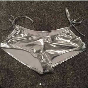 Shiny silver raver booty shorts