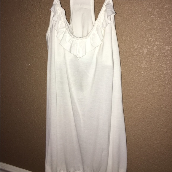 White ruffled tank