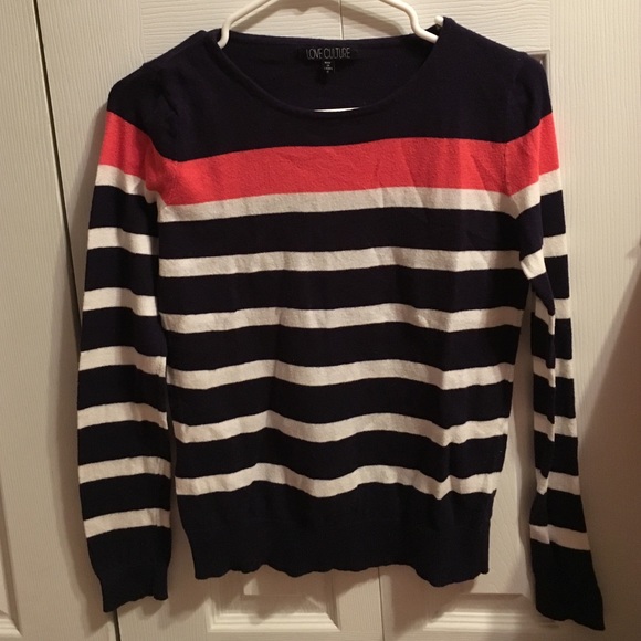 Navy blue sweater with white stripes, one pink