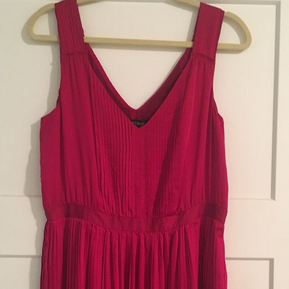 Red pleated knee length dress