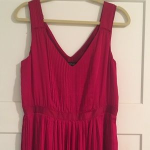 Red pleated knee length dress