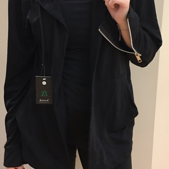 Open jacket with zippers on sleeves. - Picture 1 of 2