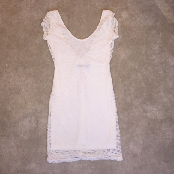Lace cap sleeves dress by BACKSTAGE. SIZE SMALL