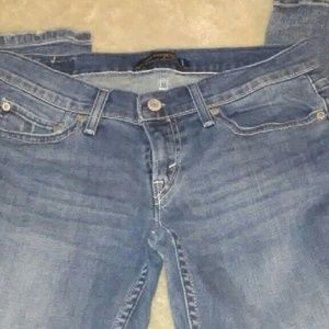 Levis too super low 524 jeans