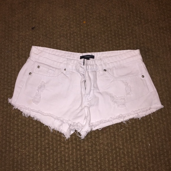 Distressed white shorts