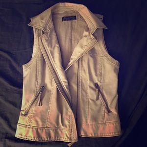 Worn leather look vest