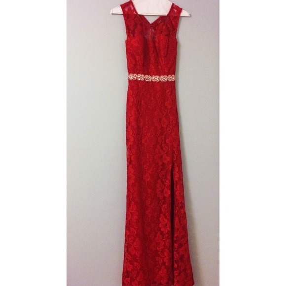 Long sleeveless red lace evening gown, & side slit
