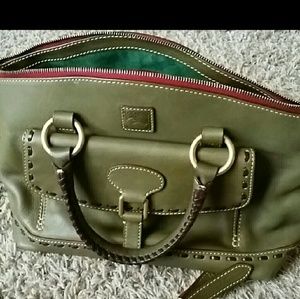 It's back.   Olive green dooney and bourke