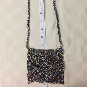 Small beaded multi colored bag with strap