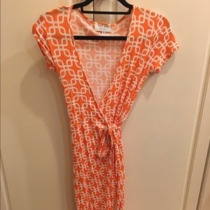Orange print wrap dress